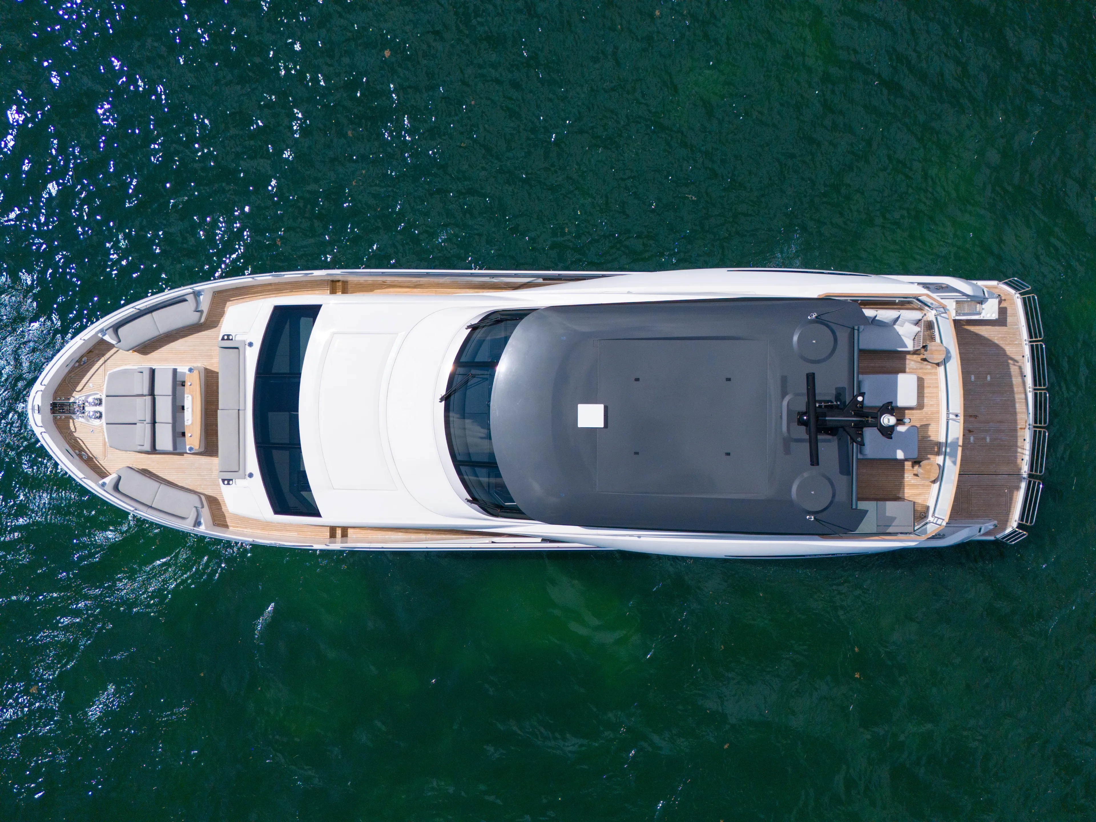 Worth The Wait Yacht Photos Pics 2024 Sunseeker Ocean 182 yacht, aerial view, cruising on open water.