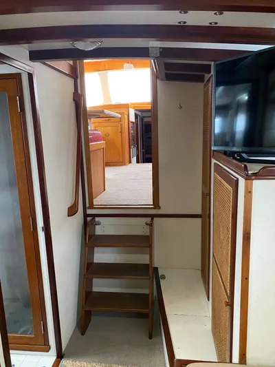 Lord Stanley Yacht Photos Pics 1988 Lyman-Morse Jarvis Newman Lobster Cruiser interior with wooden stairs and modern amenities.