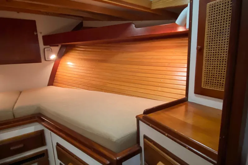 Lord Stanley Yacht Photos Pics 1988 Lyman-Morse Jarvis Newman Lobster Cruiser interior with wood paneling and cozy cabin.