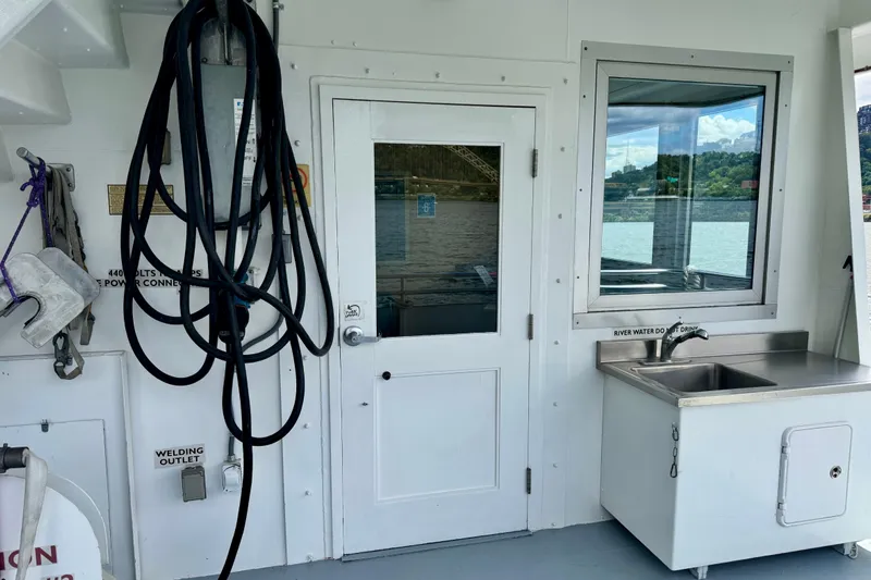 M/v Explorer Yacht Photos Pics Interior of a 2016 custom commercial research riverboat with sink and equipment.