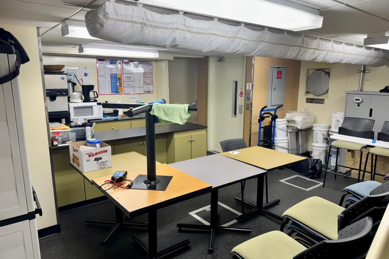 M/v Explorer Yacht Photos Pics Interior of a 2016 Custom Commercial Research Riverboat with kitchen and meeting area.