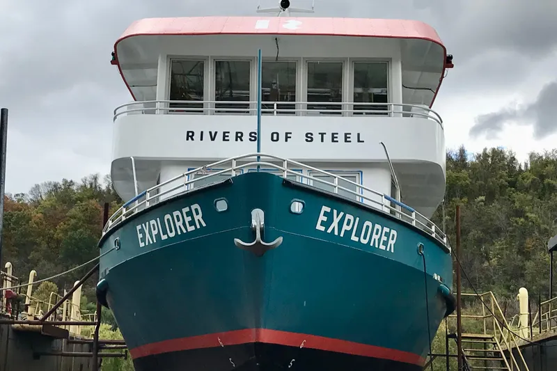M/v Explorer Yacht Photos Pics Custom 2016 Commercial Research Riverboat "Explorer" docked, featuring "Rivers of Steel" branding.