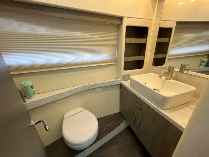 Great Expectations Yacht Photos Pics Luxurious bathroom in 2020 Regal 38 XO yacht with modern sink and toilet.