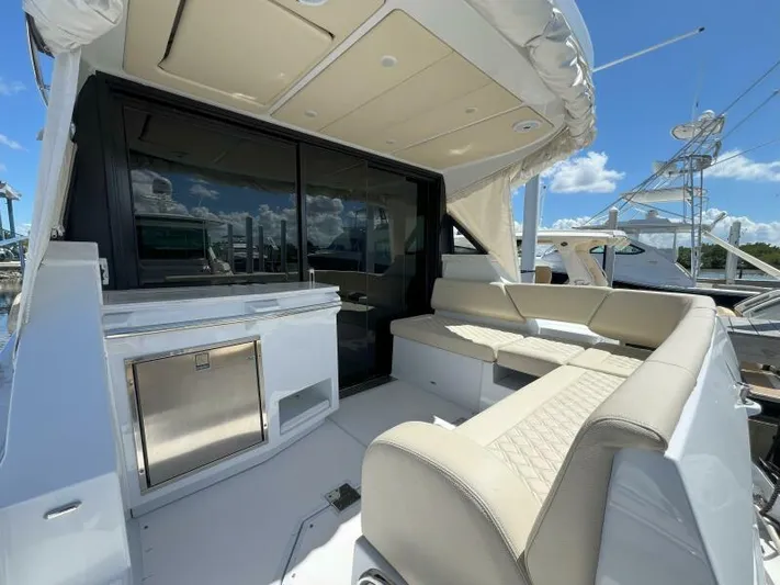 Great Expectations Yacht Photos Pics 2020 Regal 38 XO yacht interior with luxurious seating and modern amenities.