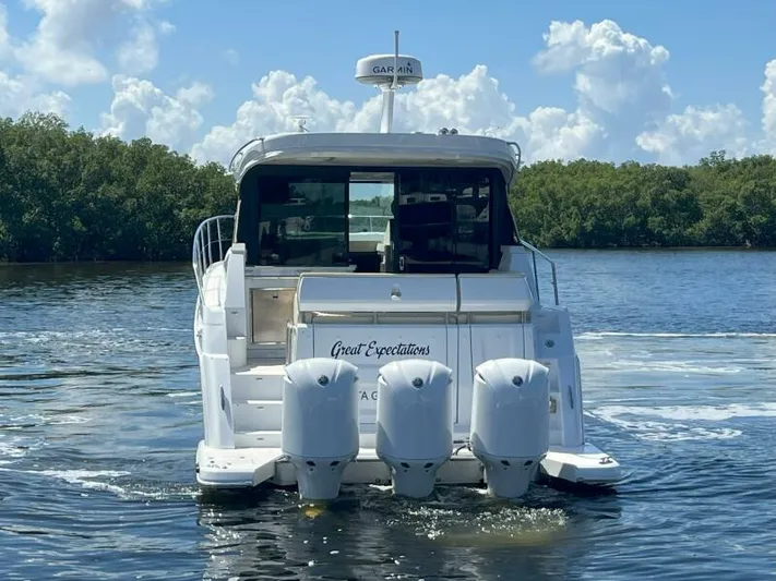 Great Expectations Yacht Photos Pics 2020 Regal 38 XO boat on water, rear view with triple engines.