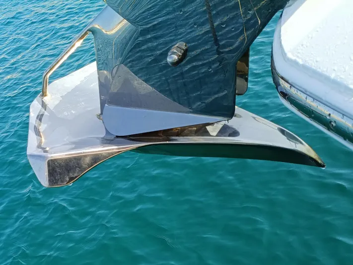 Waypoint Yacht Photos Pics 2024 Fairline Squadron 50 anchor detail over clear blue water.