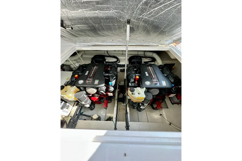 Carpe Diem Yacht Photos Pics Engine compartment of a 2015 Rinker 340 Express Cruiser with dual engines.
