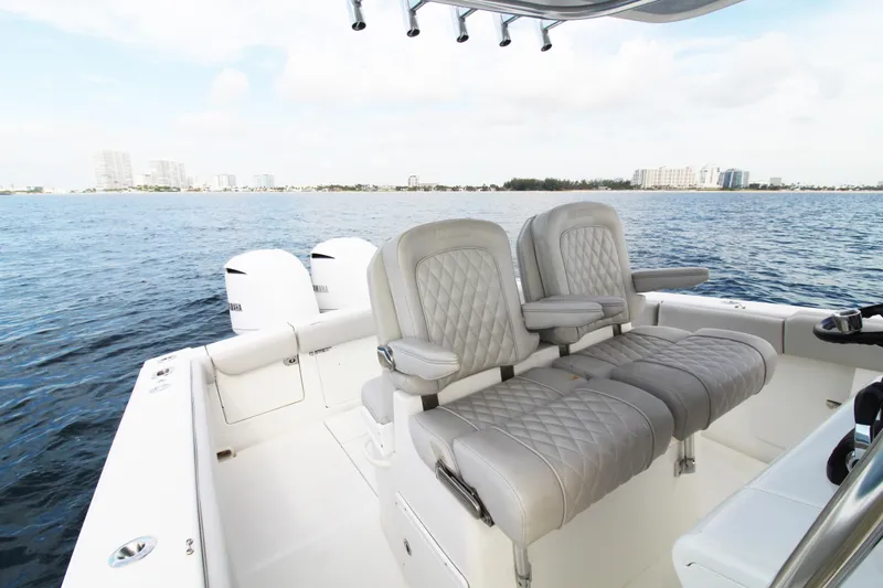  Yacht Photos Pics 2019 Jupiter 30 HFS boat interior with luxurious seating on open water.