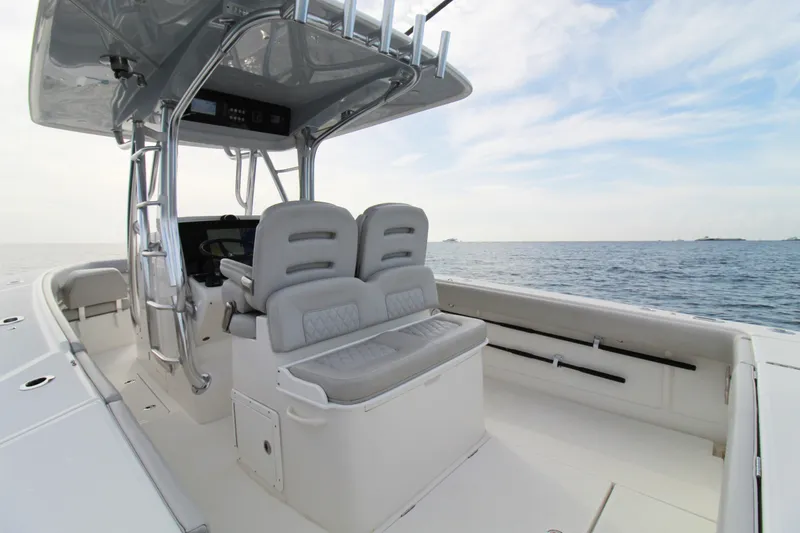  Yacht Photos Pics 2019 Jupiter 30 HFS boat interior with dual seats and ocean view.