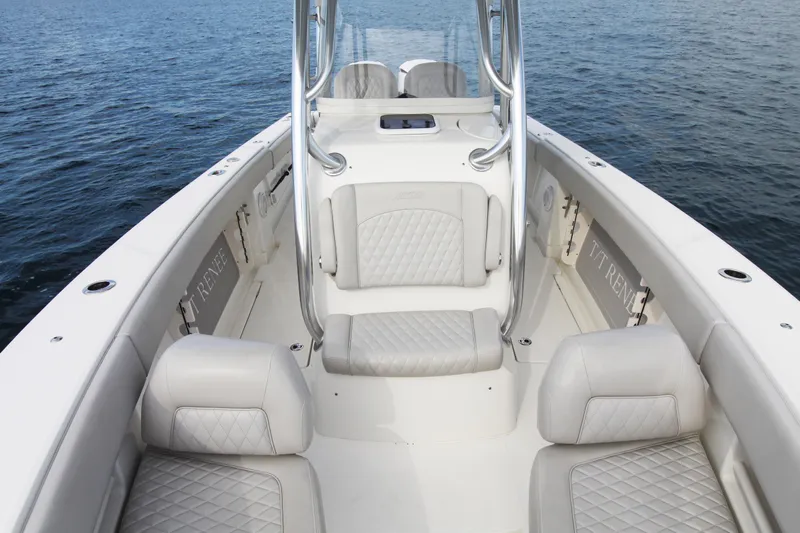  Yacht Photos Pics 2019 Jupiter 30 HFS boat interior with cushioned seating on calm water.