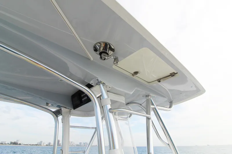  Yacht Photos Pics 2019 Jupiter 30 HFS boat's T-top with stainless steel supports and ocean view.