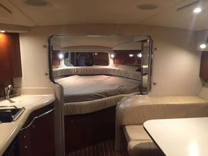 Vamonos Yacht Photos Pics Interior of 2001 Sea Ray 340 Amberjack yacht, featuring cozy cabin and modern amenities.