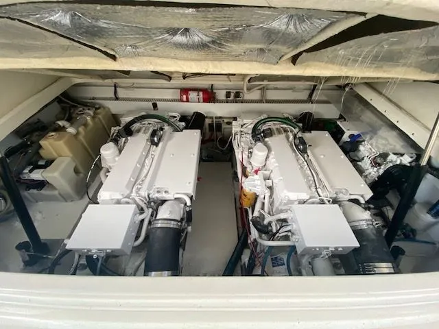 Vamonos Yacht Photos Pics Engine compartment of a 2001 Sea Ray 340 Amberjack boat, featuring dual engines.