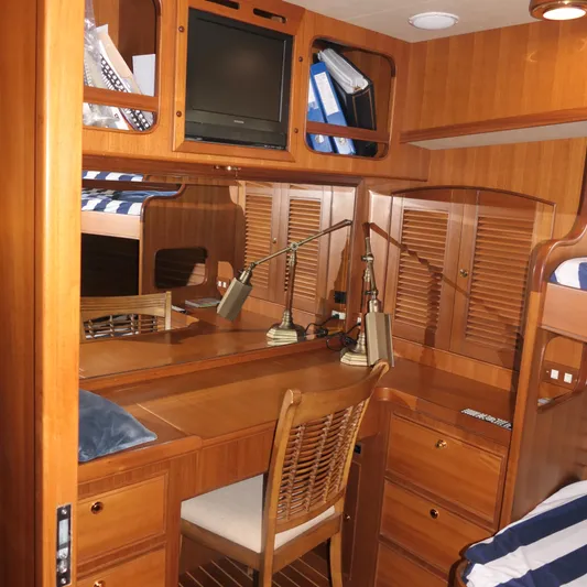  Yacht Photos Pics Interior of 2008 Marlow 53 C Explorer yacht with wooden cabinetry and desk.