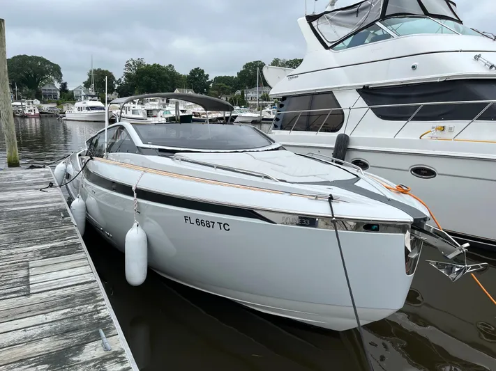  Yacht Photos Pics 2022 Fairline F//Line 33 yacht docked at marina, sleek design, white exterior.
