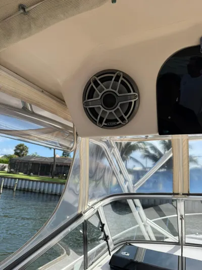  Yacht Photos Pics 2007 Grady-White Express 330 boat interior with speaker and clear enclosure.