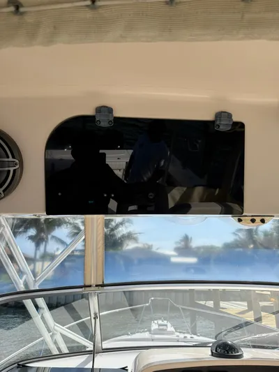  Yacht Photos Pics 2007 Grady-White Express 330 boat interior with dashboard and water view.