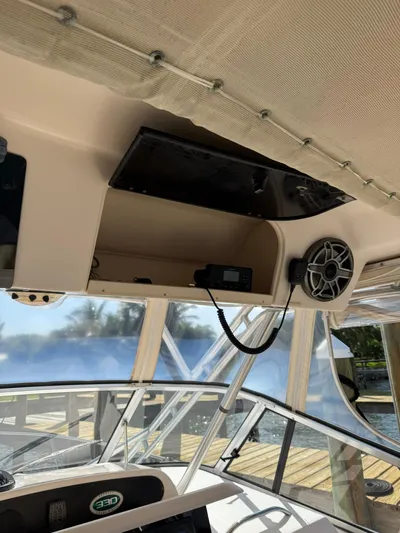  Yacht Photos Pics 2007 Grady-White Express 330 boat interior with speaker and radio equipment.