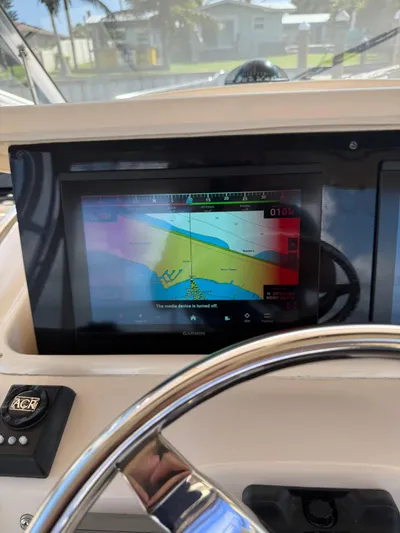  Yacht Photos Pics 2007 Grady-White Express 330 helm with Garmin navigation display.