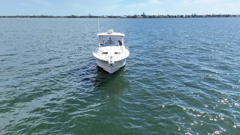  Yacht Photos Pics 2007 Grady-White Express 330 boat on open water, clear sky in background.