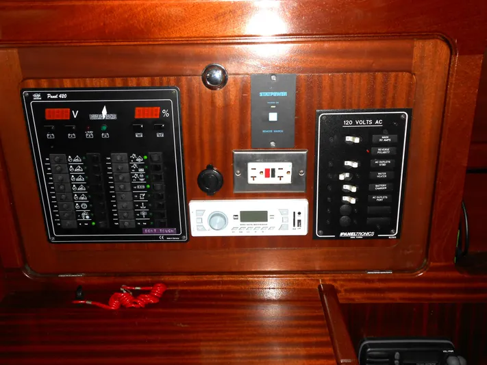 Pilitak Yacht Photos Pics Control panel of a 2001 Bavaria 37 yacht with electrical switches and gauges.