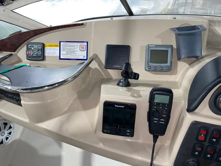  Yacht Photos Pics Control panel of a 2005 Carver 42 Mariner boat with navigation equipment.