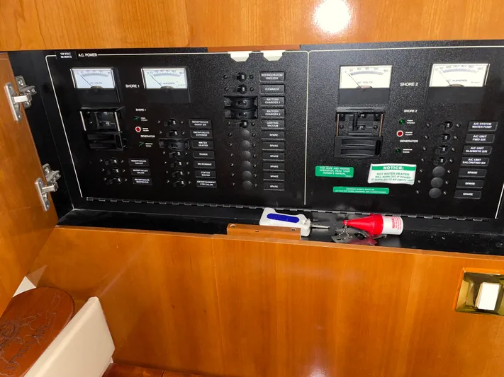  Yacht Photos Pics Electrical panel inside a 2005 Carver 42 Mariner yacht, featuring gauges and switches.