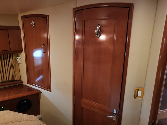  Yacht Photos Pics Interior of 2005 Carver 42 Mariner with wooden doors and cabinetry.