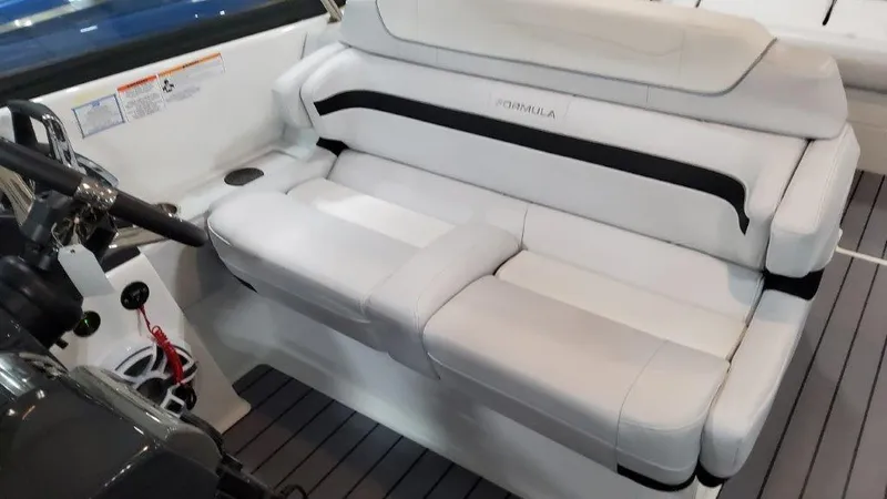  Yacht Photos Pics 2023 Formula 350 Crossover Bowrider I/O interior seating area with white upholstery.