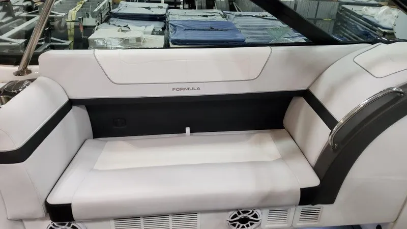  Yacht Photos Pics 2023 Formula 350 Crossover Bowrider I/O interior seating with white and black upholstery.