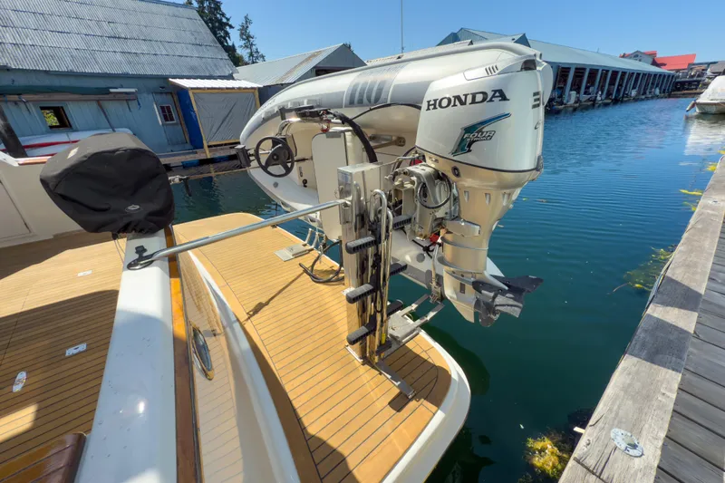 Silver Spring Yacht Photos Pics 1985 Ocean Alexander 420 Sport Sedan with Honda outboard motor at dock.
