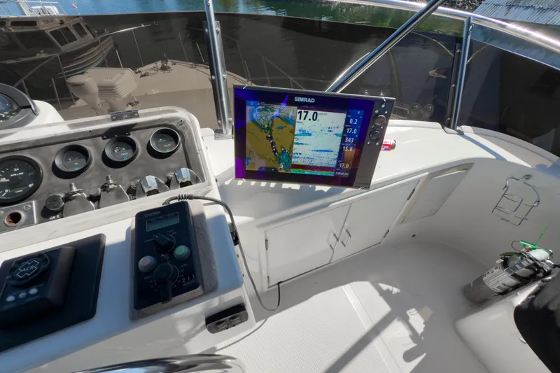 Silver Spring Yacht Photos Pics Cockpit of 1985 Ocean Alexander 420 Sport Sedan with navigation equipment and controls.