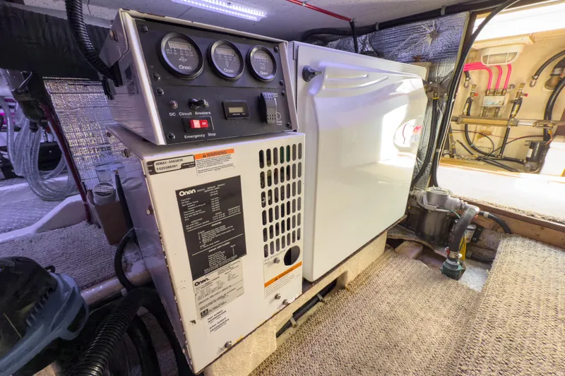 Silver Spring Yacht Photos Pics Engine room of 1985 Ocean Alexander 420 Sport Sedan with Onan generator.