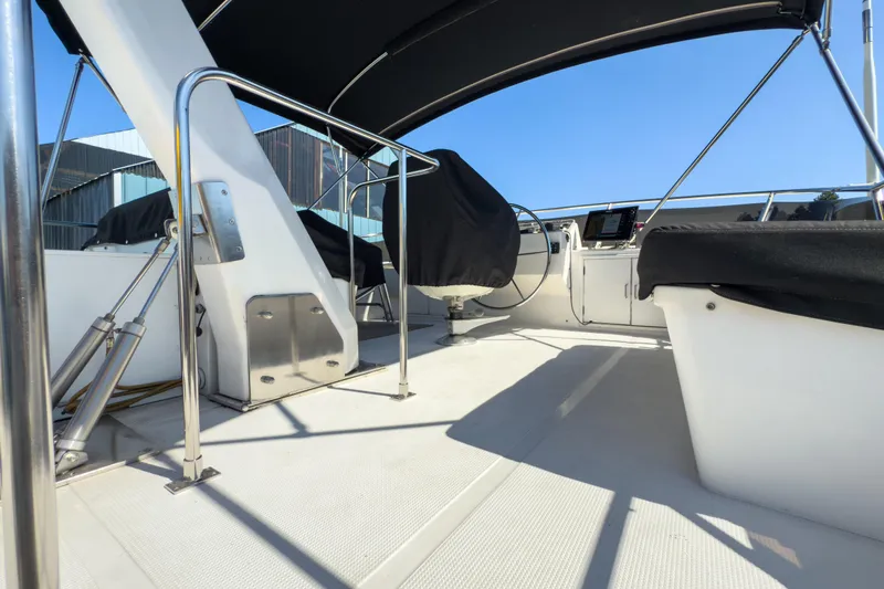 Silver Spring Yacht Photos Pics 1985 Ocean Alexander 420 Sport Sedan yacht interior with covered helm and seating.