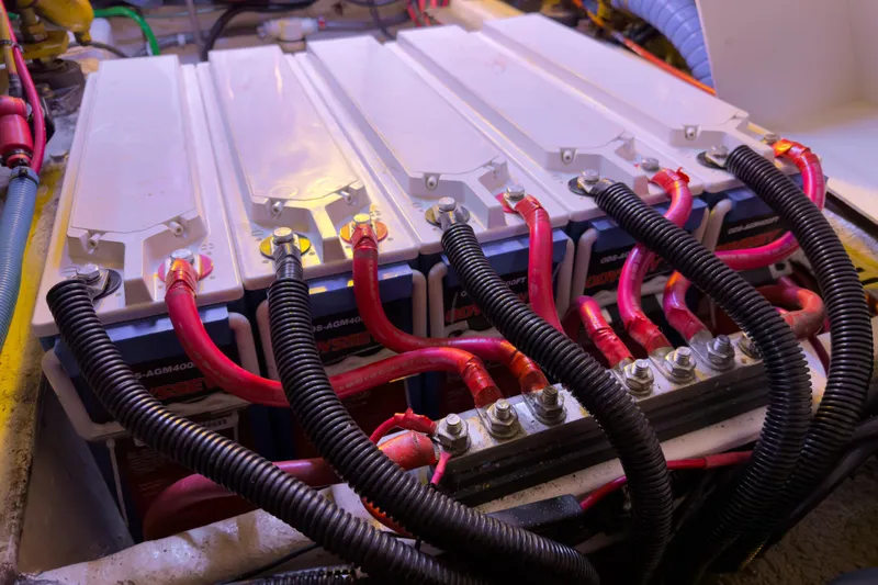 Silver Spring Yacht Photos Pics Battery setup in 1985 Ocean Alexander 420 Sport Sedan with red and black cables.