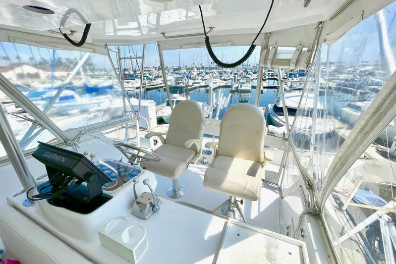 Aqua Ma'am Yacht Photos Pics Interior of 1986 Ocean 38 Super Sport yacht with marina view.