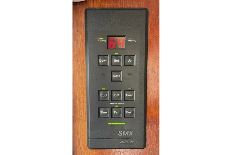 Aqua Ma'am Yacht Photos Pics 1986 Ocean 38 Super Sport thermostat control panel with digital display and buttons.