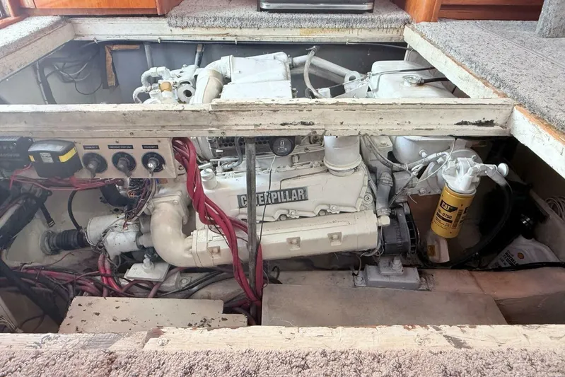 Aqua Ma'am Yacht Photos Pics Engine compartment of a 1986 Ocean 38 Super Sport boat with Caterpillar engine.