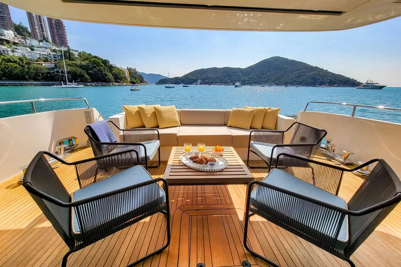  Yacht Photos Pics Luxurious 2017 Sanlorenzo SL78 yacht deck with seating, ocean view, and refreshments.