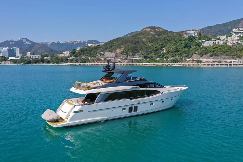  Yacht Photos Pics Luxurious 2017 Sanlorenzo SL78 yacht cruising in scenic coastal waters.