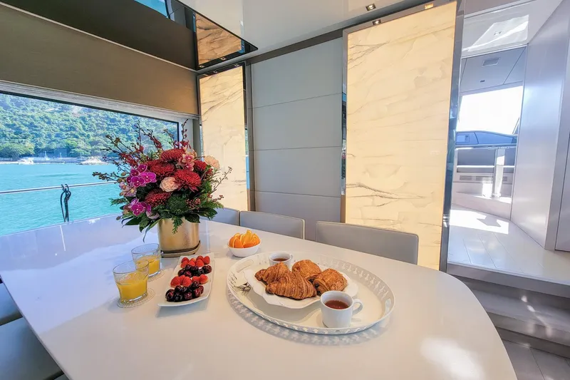  Yacht Photos Pics Luxurious dining setup on 2017 Sanlorenzo SL78 yacht with scenic ocean view.