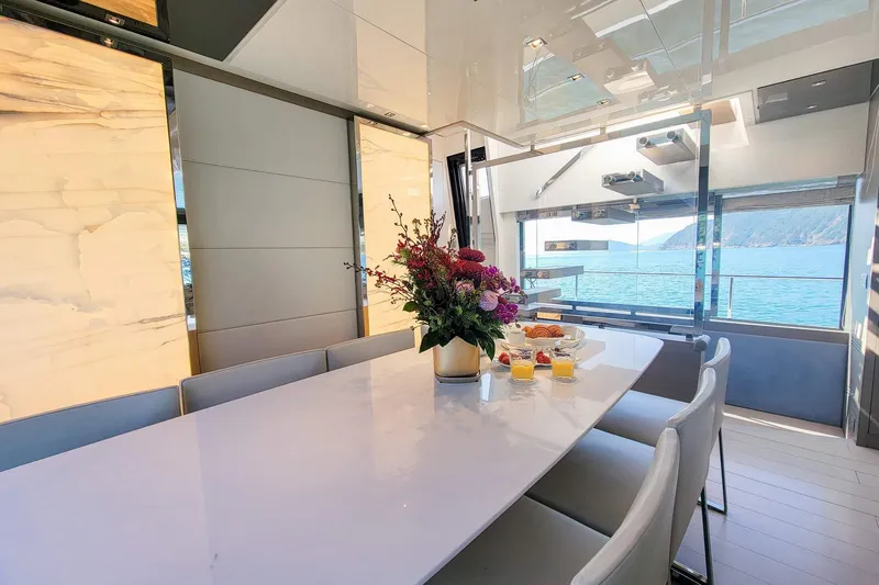  Yacht Photos Pics Luxurious dining area on 2017 Sanlorenzo SL78 yacht with ocean view and elegant decor.