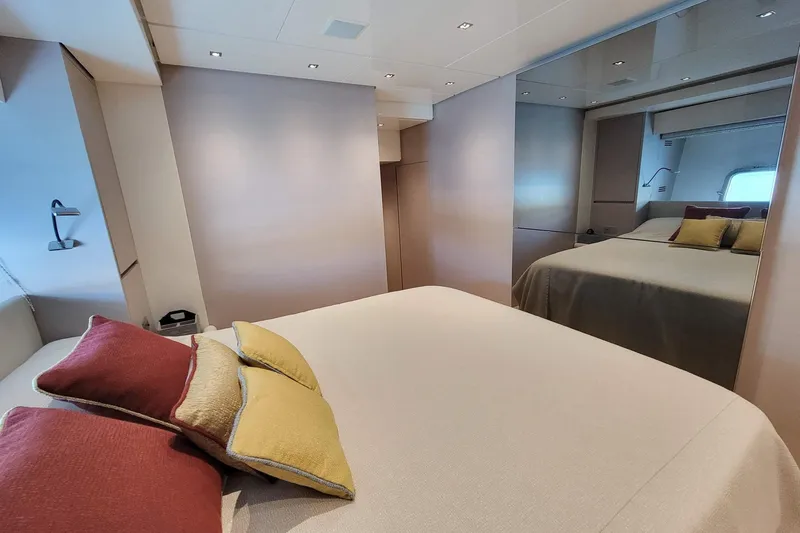  Yacht Photos Pics Luxurious bedroom interior of 2017 Sanlorenzo SL78 yacht with elegant bedding and cushions.