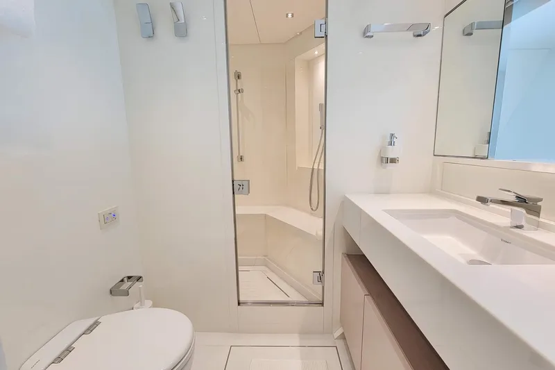  Yacht Photos Pics Luxurious bathroom in 2017 Sanlorenzo SL78 yacht, featuring modern fixtures and elegant design.