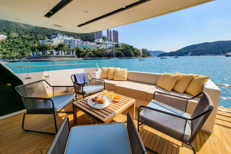  Yacht Photos Pics Luxurious 2017 Sanlorenzo SL78 yacht deck with elegant seating and scenic ocean view.