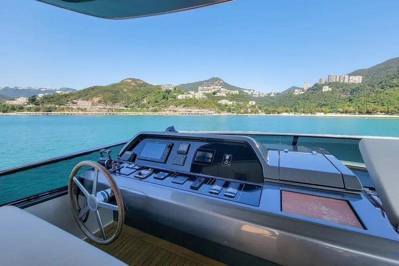  Yacht Photos Pics Sanlorenzo SL78 yacht helm with scenic coastal view, 2017 model.