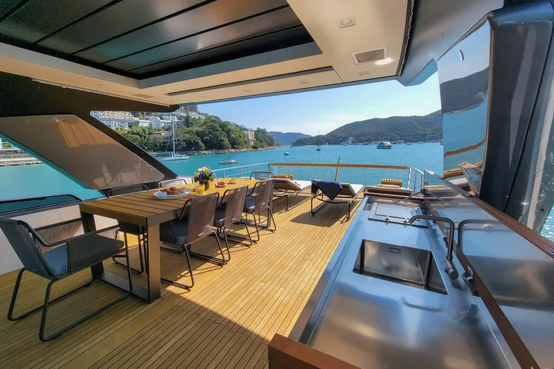  Yacht Photos Pics Luxurious 2017 Sanlorenzo SL78 yacht deck with dining area and stunning ocean view.
