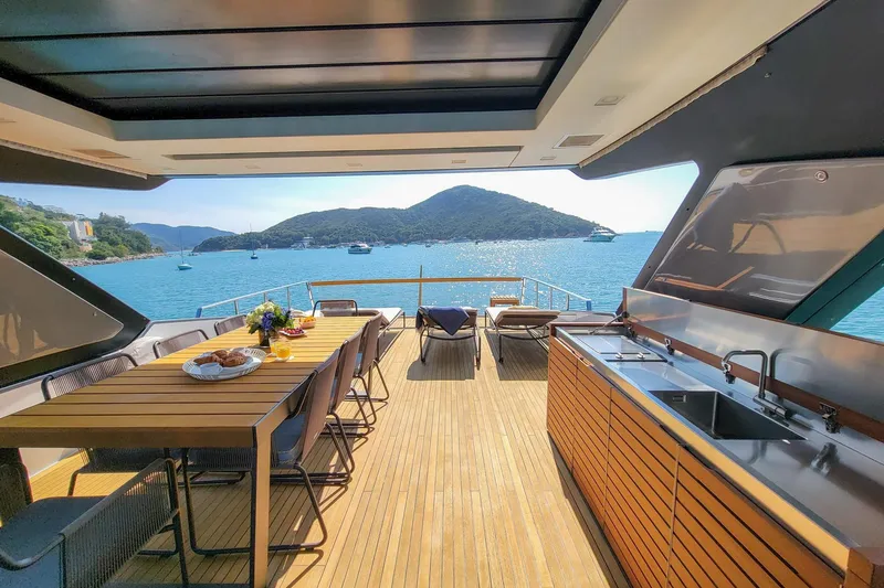  Yacht Photos Pics Luxurious 2017 Sanlorenzo SL78 yacht deck with dining area and ocean view.