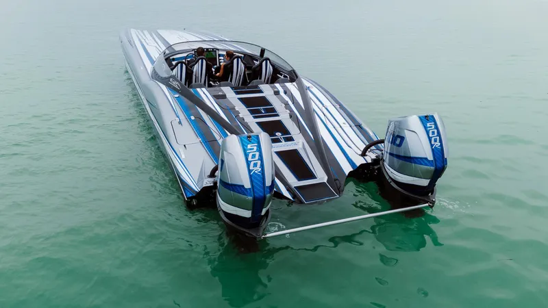  Yacht Photos Pics 2024 MTI 440X powerboat with dual engines on calm water.