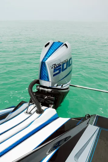  Yacht Photos Pics 2024 MTI 440X boat with Racing 500 engine on turquoise water.